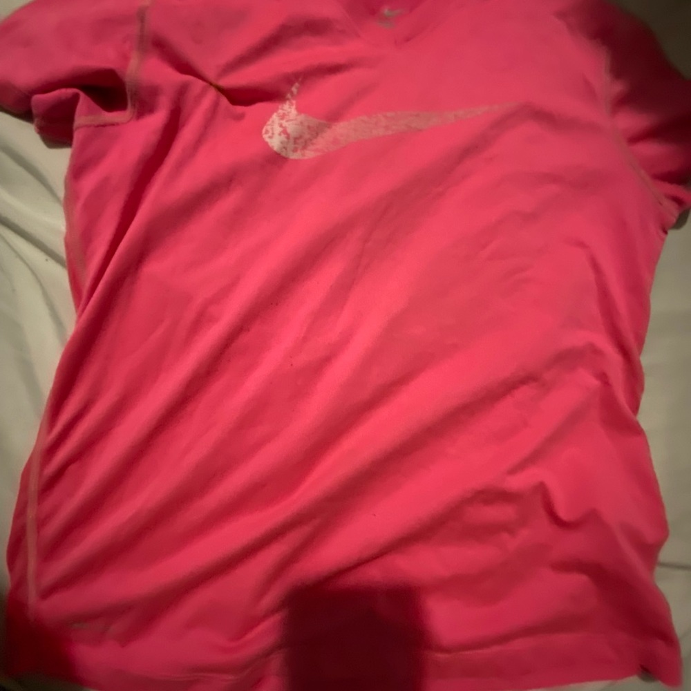 Pink Nike shirt